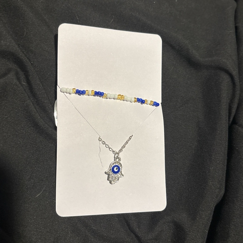 Silver Hamsa Hand Necklace with Blue Evil Eye